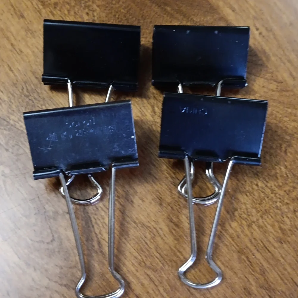 Assorted size binder paper Clips